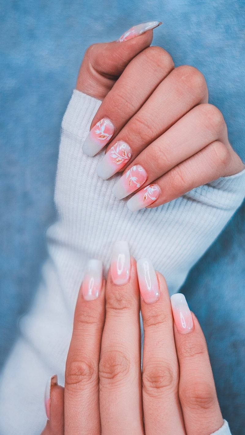 Long ombre nails with small floral details